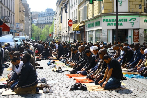 Muslims pray in the streets of France.